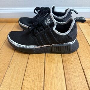 Adidas NMD R1 black with white logo stripe